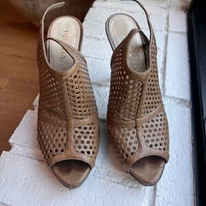 Prada camel leather open weave platform heels with peek-a-boo toe. Size 37.